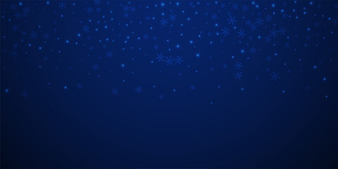Sparse glowing snow Christmas background. Subtle f