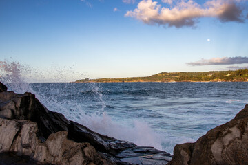 Waves Crashing against rocks in Hawaii.