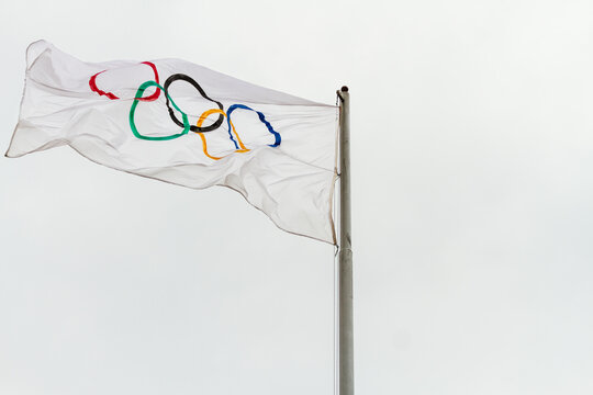 Buenos Aires, Argentina - May 8, 2017: Olympic flag against overcast sky at the downtown of Buenos Aires