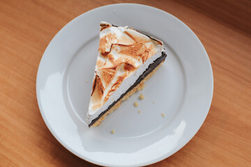 Lemon curd and meringue horizontal. Traditional french sweet pastry tart. Delicious, appetizing, homemade dessert with lemon curd cream. Copy space