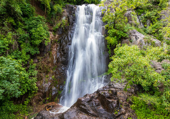 Fototapeta na wymiar Beautiful front shot of the third Tepalo Waterfall in Ajijic Mexico. 