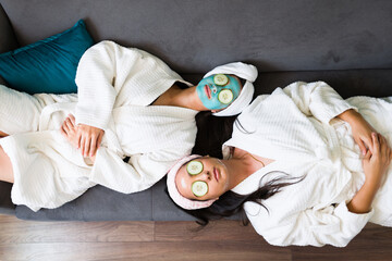 Best friends relaxing with a home spa - obrazy, fototapety, plakaty
