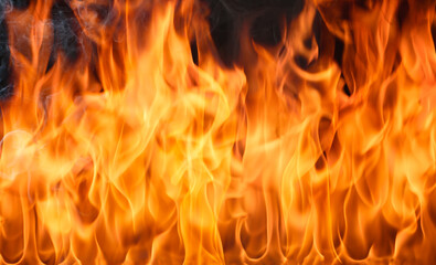 A burning flame And smoke on a black background