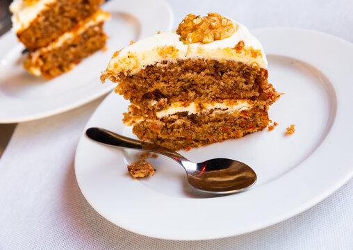 Slice of delicious carrot cake closeup. High quality photo