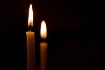 candles that are lit in the dark