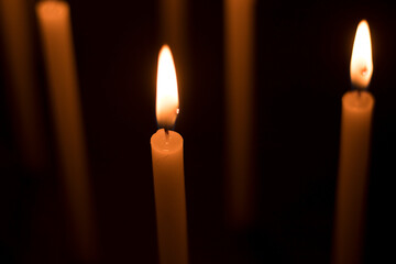 candles that are lit in the dark