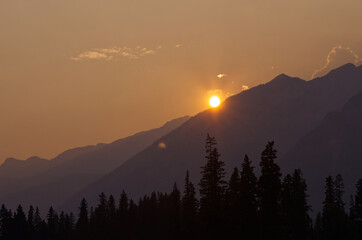 Setting Sun Sinking behind the Mountain
