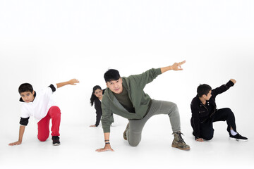 Group of Kid team activity dancing class with teacher in white studio background.