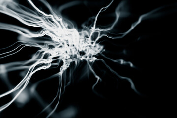Abstract black and white artwork created by light painting through time exposure. 