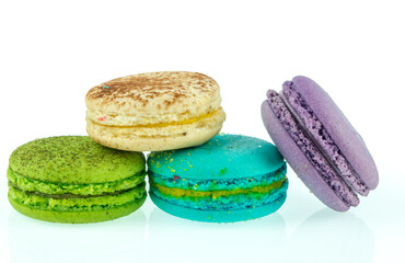 Colorful macarons on white background. Macaron or Macaroon is sweet meringue-based confection.