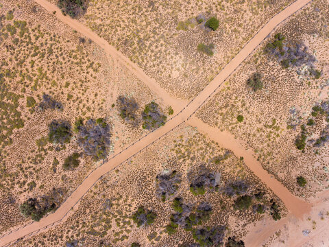 Looking Down Onto A Coastal Path And Walkway Intersecting