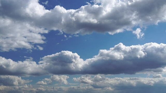 Only summer blue sky. Beautiful panorama of blue sky with white clouds. Relaxing view of moving transforming clouds. No buildings. Full HD Time Lapse 1080p