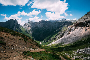High altitude mountain landscape under blue sky