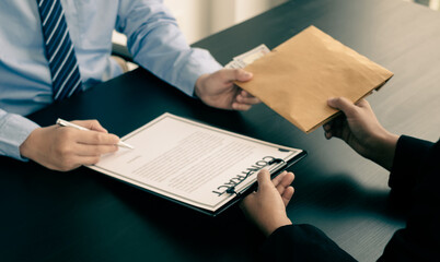 Corruption. Businessmen make an agreement with the money proposed his partner to bribe in the...