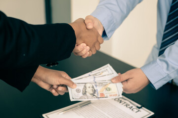 Corruption. Businessmen make an agreement with the money proposed his partner to bribe in the office and make a contract under an agreement. Illegal money fraud The concept of bribery and corruption