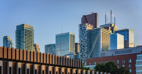 Skyscrapers s and modern high rise buildings in Financial District of Toronto with clear blue sky in the background