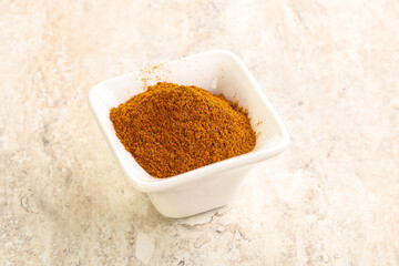 Dry Paprika powder in the bowl