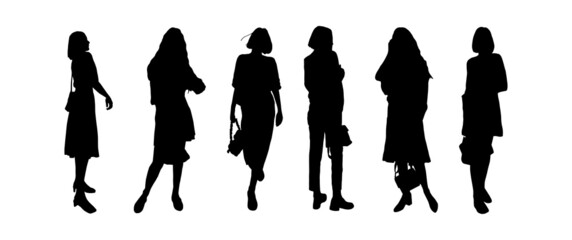 Silhouettes of a group of young girls models posing in modern clothes. For printing and laser cutting. Vector illustration.
