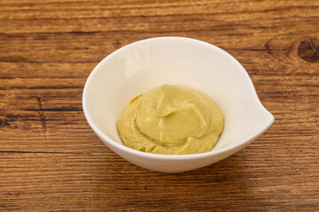 Dijon mustard sauce in the bowl