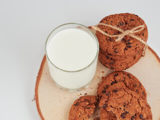 Homemade oatmeal cookies folded in a pile on the old table