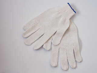 Construction work gloves, white on a white background