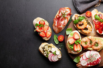Appetizers board with traditional spanish tapas set. Italian antipasti brushetta snacks