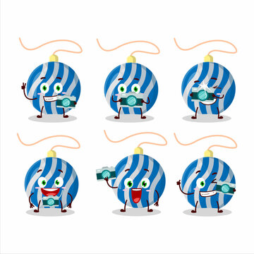 Photographer profession emoticon with christmas lights blue cartoon character
