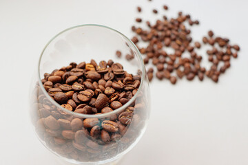 Coffee beans in a transparent glass