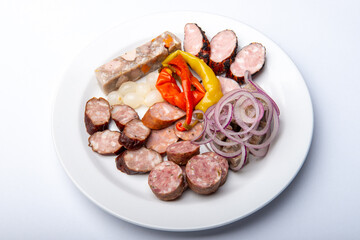 Mixed sausages with pickled peppers and onions