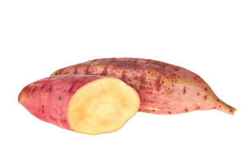 Ripe sweet potatoes on a white background