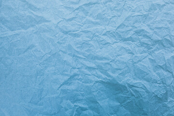 Obraz premium Blue paper with wrinkles texture
