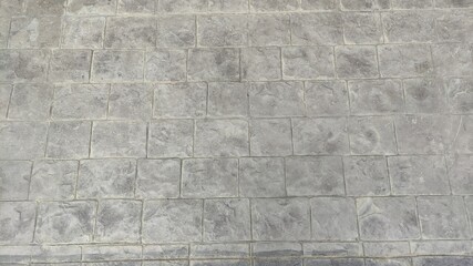 Close up photo of cement tiles outside the building pattern