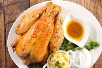 roasted chicken with sauce and mashed potato