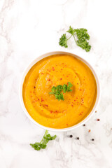 vegetable soup in bowl with parsley