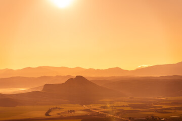 Obraz premium aerial view of the mountains at sunset