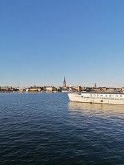 Sunset over the beautiful Stockholm coastline and ocean with a city view