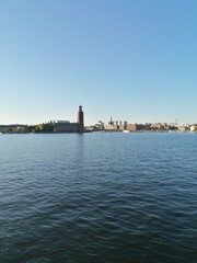 Sunset over the beautiful Stockholm coastline and ocean with a city view