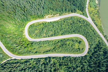 View from above of the mountain winding road in summer. Carpathian mountains. Ukraine