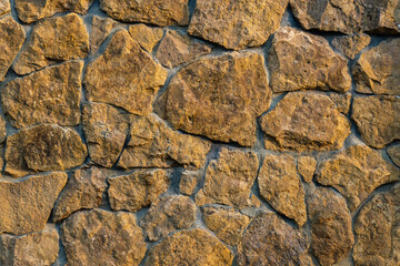 Texture. Stone of yellow and orange color