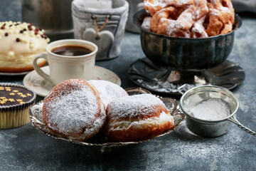 Fat Thursday celebration - traditional donuts filled with marmalade. - obrazy, fototapety, plakaty