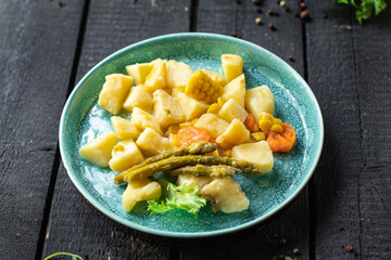 potatoe stewed vegetable stew ragout home cooking food no meat meal snack on the table copy space food background rustic top view 