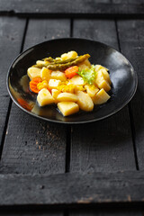 potatoe stewed vegetable stew ragout home cooking food no meat meal snack on the table copy space food background rustic top view 