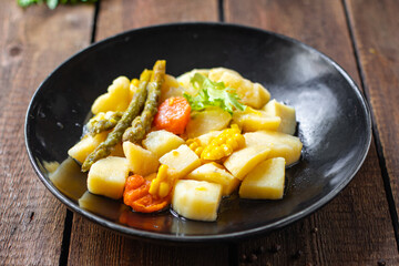 potatoe stewed vegetable stew ragout home cooking food no meat meal snack on the table copy space food background rustic top view 
