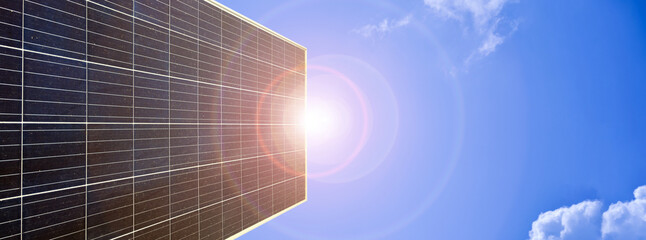 Photovoltaic panel with sunlight at noon background, concept for storing and using the powor from...