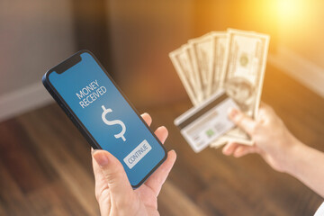 Mobile payment received illustration background, money and mobile phone in woman hand close-up