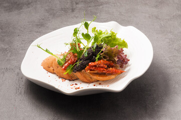 bruschetta with dried tomatoes and mushroom caviar