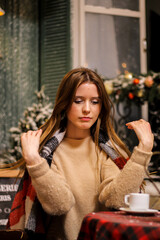 winter mood, holiday. The girl covered herself with a blanket. new Year.