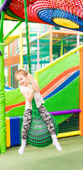 Child plays fun in the entertainment center. Game center