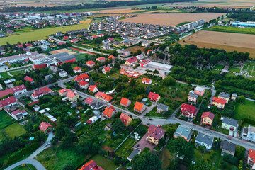 Small town in Europe, aerial view. Residential buildings and streets in small city