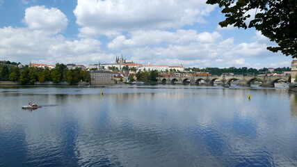 Fototapeta na wymiar picturesque view of the Vltava River, Charles Bridge and Prague
